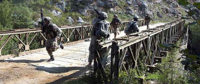 Portable temporary army bailey bridge military use