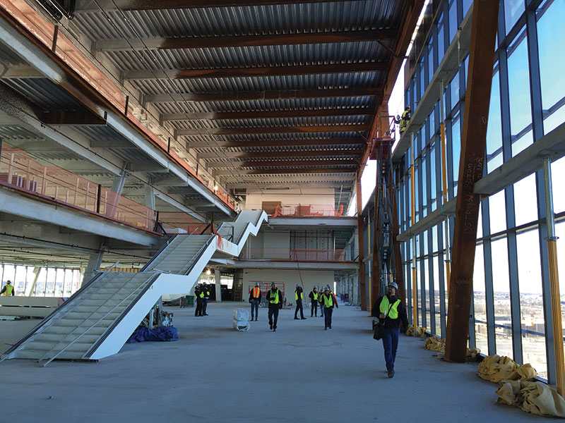 Upper bar atrium with long span steel staircase connecting levels