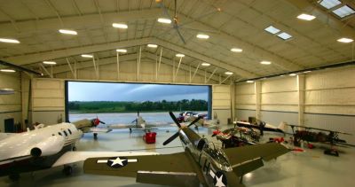 Rigid Frame Steel Buildings:Classic Air Hangar with large open door