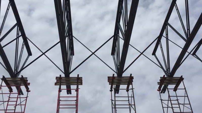 185 foot steel joist secured with steel frame